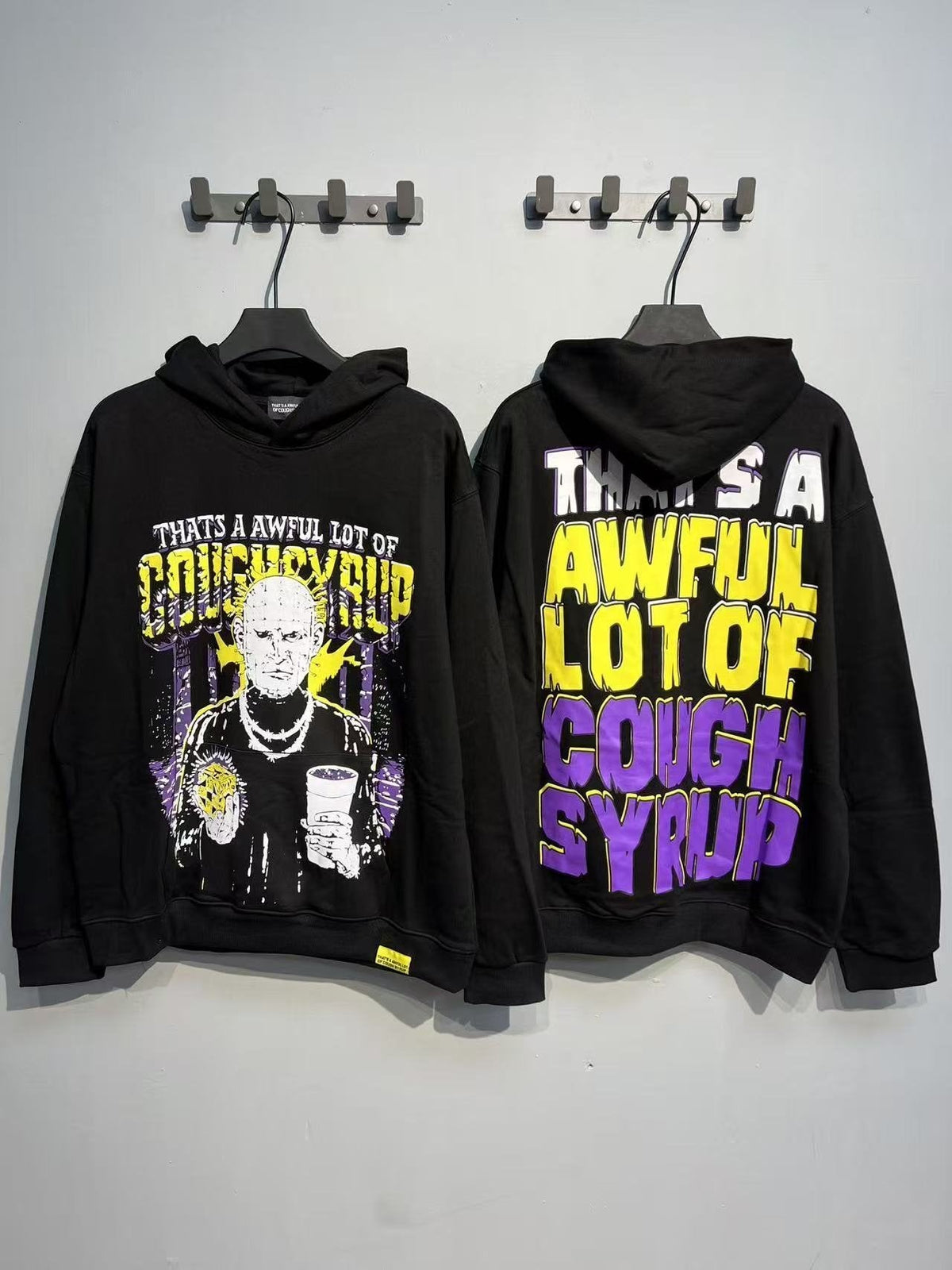 THAT'S A AWFUL LOT OF COUGH SYRUP Star Graphic Hoodie — context